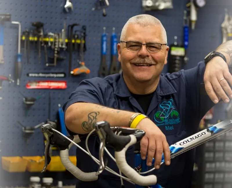 Bike shop owner with extra credit.
