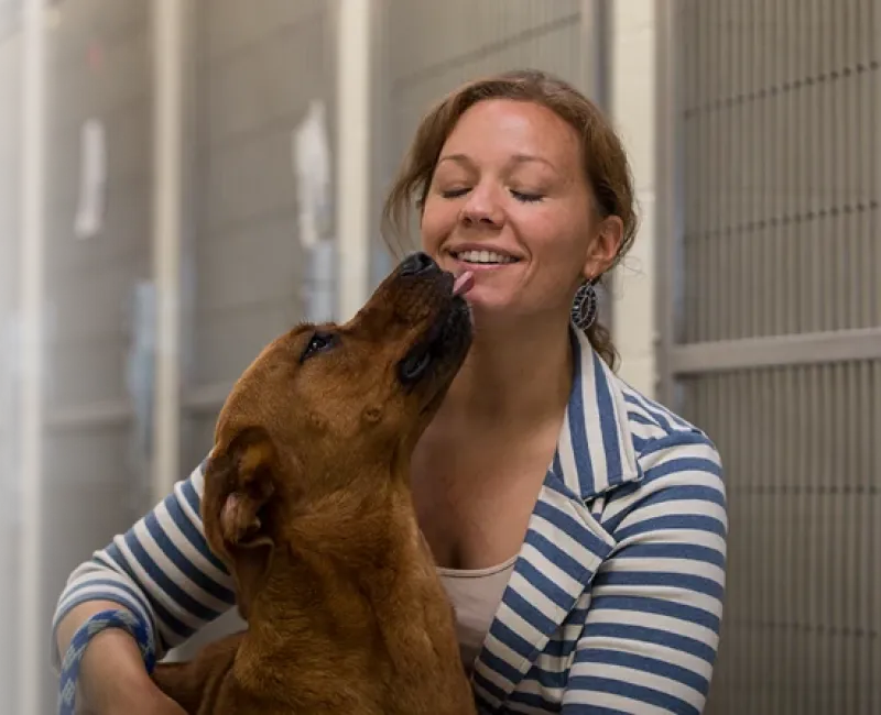 Animal shelter owner with her dog.